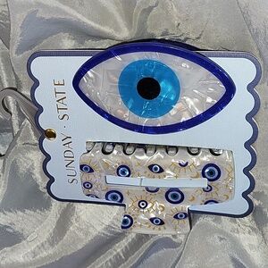 Evil eye hairclips brand new on card